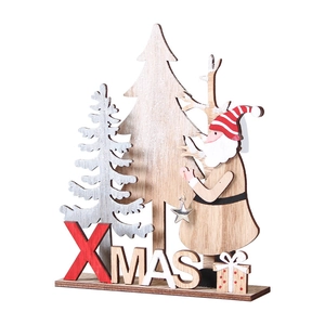 Handcrafted wooden Santa Claus and Xmas tree tabletop decoration for festive home decor