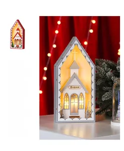 Detail showing lighted wooden Christmas church decor with LED warm light and Xmas text