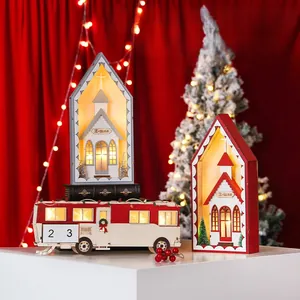 Macro view of Christmas LED wooden church and bus ornaments with festive warm lighting