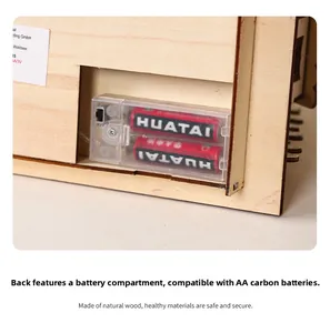 Detail view of the wooden craft LED battery compartment and laser-cut wood texture