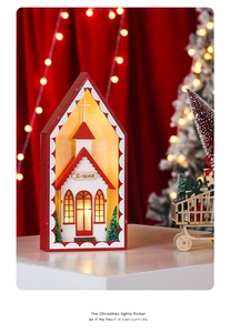 Detail of wooden Christmas church lamp with warm LED glow and X-mas engraving