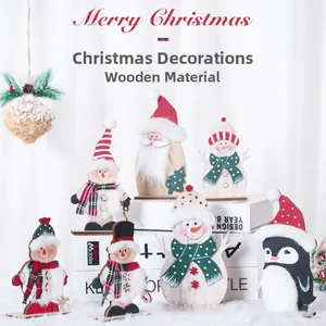 Festive wooden Christmas figurines set featuring Santa and Snowman with warm textile details