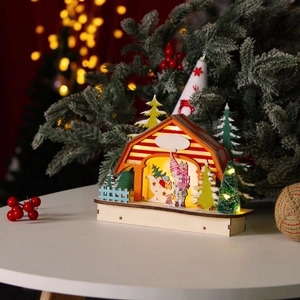 Illuminated Christmas wooden house ornament with LED light and festive holiday scene