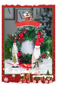 Détail de figurines Père Noël en bois de 41cm peintes à la main avec décor nordique