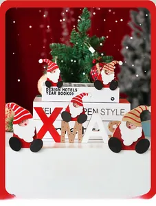 Close-up of hand-painted 12cm wooden Santa ornaments and XMAS letter decor set