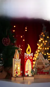 Close-up of lighted 26cm wooden Christmas candle ornaments with reindeer cutout designs