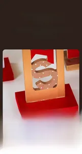 Detailed view of the smooth, round edges and polished finish of the 26cm wooden ornament