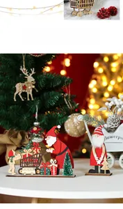 Festive wooden Santa and reindeer tabletop ornament with laser-cut trees and base
