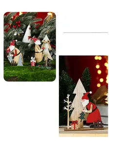Detailed view of hand-painted wooden Santa and Christmas tree festive desktop ornaments