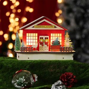 Detail of illuminated wooden Christmas store with LED lights and white reindeer figurines