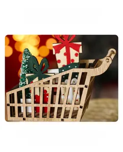 Close-up of wooden Christmas cart ornament with mini tree and painted gift boxes