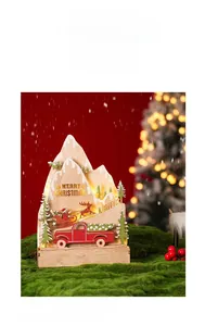Detail of LED wooden Christmas ornament with multi-layer carving and warm glowing light