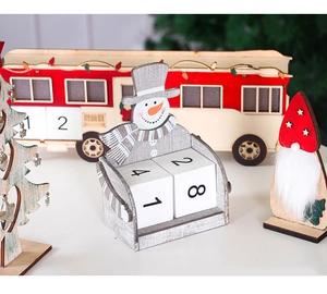Detailed view of a wooden snowman countdown calendar with movable number blocks for Christmas
