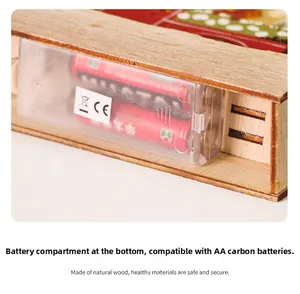 Detail showing the bottom battery compartment for LED wooden Christmas ornaments