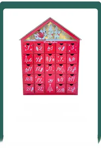 Macro detail of the wooden Christmas advent calendar with 24 small red storage drawers