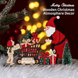 Handcrafted painted wooden Santa Claus tabletop decoration with mini Christmas tree