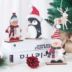 Christmas wooden LED decor featuring reindeer, penguin and snowman on a white background