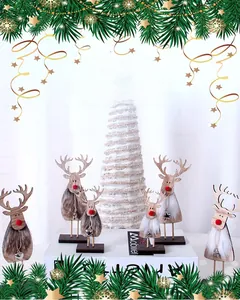 Detail of wooden Christmas reindeer figurines with faux fur, bells, and star accents