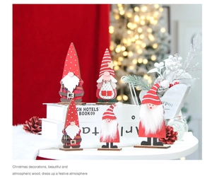 Detailed view of five wooden Christmas gnomes with fluffy white beards and festive hats