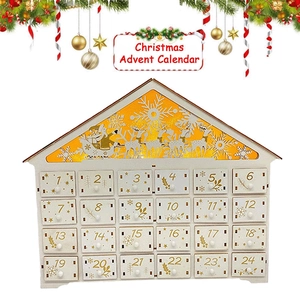 Wooden Christmas advent calendar with 24 drawers and warm light winter scene carving