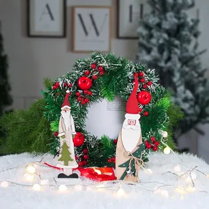 Figurine de Père Noël en bois peint de 41cm avec décorations d'étoiles pour la table