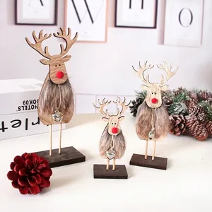 Three-piece wooden Christmas reindeer set with red noses and bells on bases