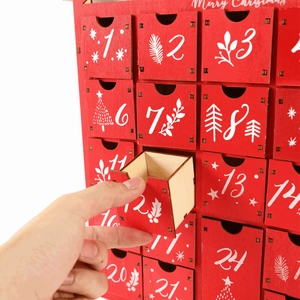 Wooden 24-drawer advent calendar in red for Christmas countdown with LED lights