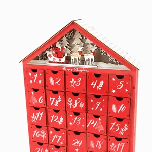 Illuminated red wooden advent calendar house with 24 drawers and reindeer landscape
