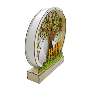 Side view of multi-layered 3D laser cut wooden Easter rabbit ornament with LED light