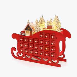 Weihnachts-Adventskalender aus Holz in Schlittenform mit 24 Schubladen und LED-Licht