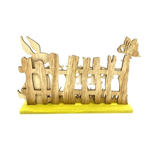 Easter wooden decoration featuring a bunny, butterfly and HAPPY cutout on a yellow base