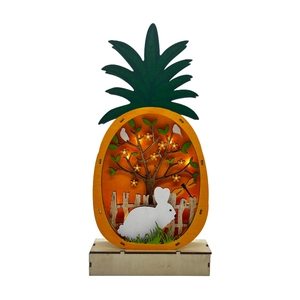 Detail of LED wooden pineapple decoration with layered Easter rabbit scene cutout