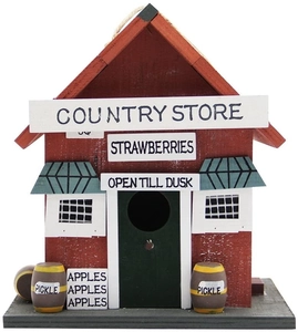 Detailed view of the red wooden country store birdhouse with a green awning and rope