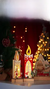 Detail of wooden LED Christmas candle ornaments with festive reindeer and tree painting