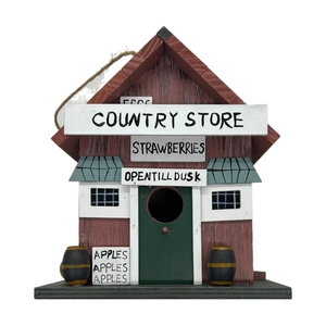 Detail of Country Store style wooden birdhouse with rustic signs and miniature apple decor