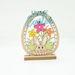 Detail of wooden Easter egg ornament with Happy Easter text and cute bunny design