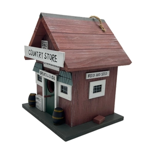 Macro detail of red wooden birdhouse featuring Country Store design and hanging rope