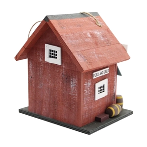 Hanging wooden barn bird feeder with rustic red finish and Feed and Seed logo