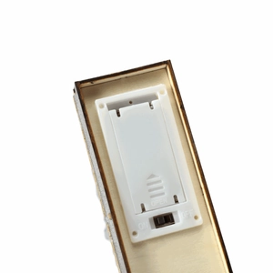 Detail of wooden ghost craft featuring a battery compartment with an on-off switch