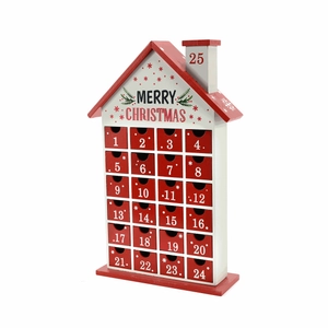 Close-up of a wooden Christmas advent calendar house with 24 red numbered storage drawers