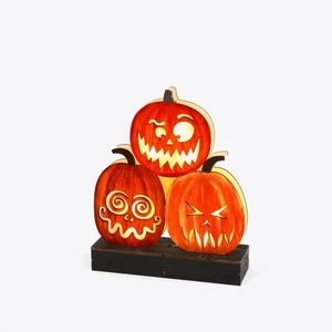Three-tier glowing wooden pumpkin stack decoration for Halloween party on black base