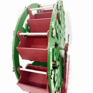 Wooden Christmas ferris wheel countdown calendar ornament with red and green wooden slots
