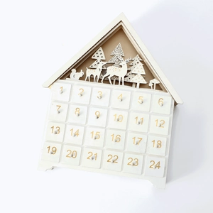 White wooden house advent calendar with 24 numbered drawers and LED forest carvings