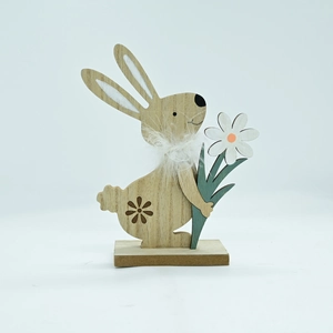 Detail of wooden Easter bunny with natural wood grain, white fur collar and floral carving