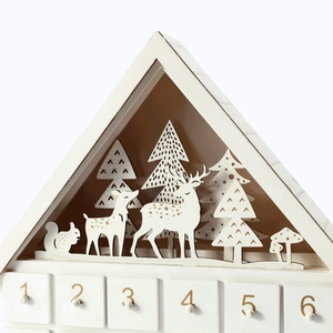 White wooden house advent calendar with 24 drawers and LED forest scene decor