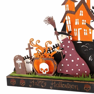 Detail of multi-layer wooden Halloween witch and haunted house decor with Happy Halloween text