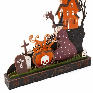 Lighted multilayer wooden Halloween ornament featuring witch and haunted house