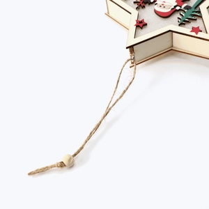 Detail of wooden star-shaped Christmas ornament with Santa Claus and hemp rope