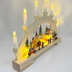 Detail of wooden Christmas LED bridge light with 7 warm bulbs and a winter village scene