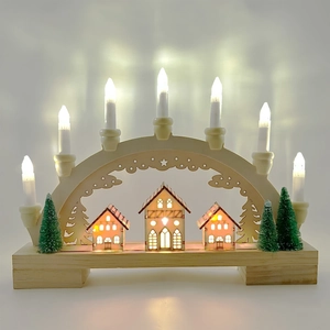 Traditional wooden Christmas LED candle bridge with carved houses and warm glowing lights